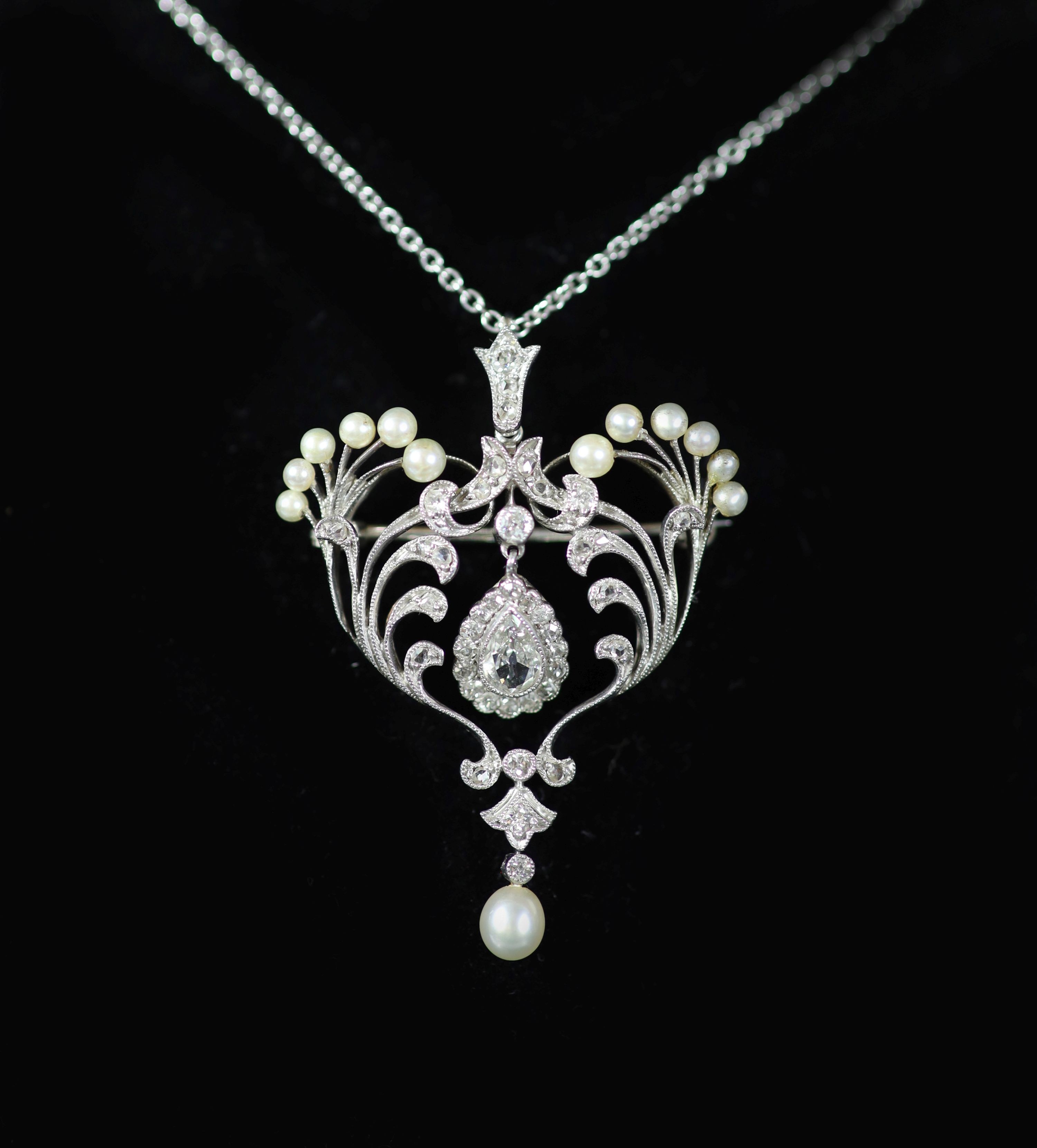 A 1920's style platinum, round and rose cut diamond and cultured pearl set drop pendant necklace